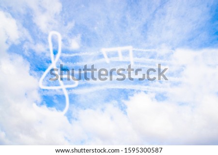 Music in heaven. Music violin clef sign or G-clef or treble clef and notes in the sky Royalty-Free Stock Photo #1595300587