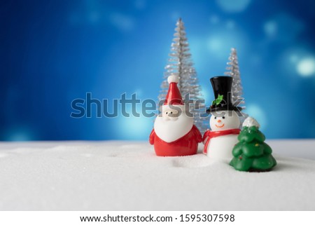 santa claus and snowman with snow background