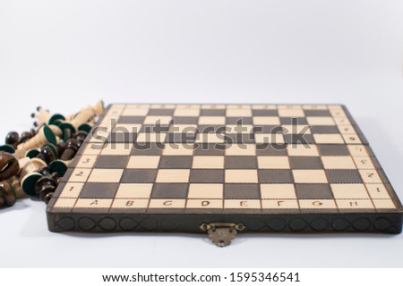 Chess board without pieces. Beginning of the game. Wooden chessboard. Royalty-Free Stock Photo #1595346541