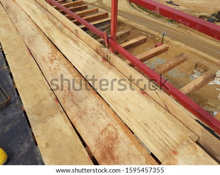 Wooden scaffolding and platforms on a constrcution project