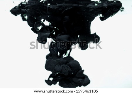 Picture of pen ink being drowned in water