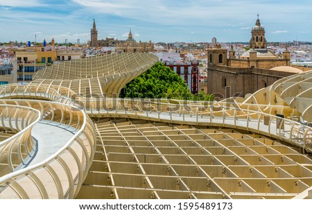 Panoramic view from the Metropol Parasol terrace on a sunny summer afternoon in Seville, Andalusia, Spain. Royalty-Free Stock Photo #1595489173