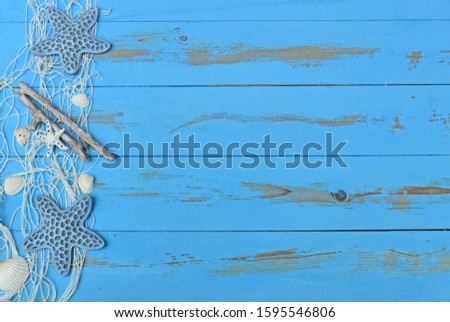 Maritime background with fishing net starfish and shells