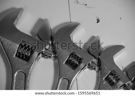Silver adjustable wrench closeup-black and white