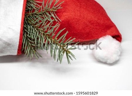 New year's red cap of Santa Claus. red white on white background.concept