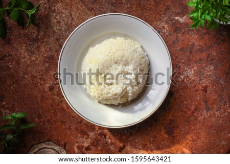 rice
boiled
(porridge of round-grain rice, main course) menu concept. food background. top view. copy space