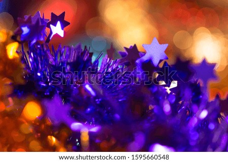 Star-shaped Christmas garland in a daylight, Russia