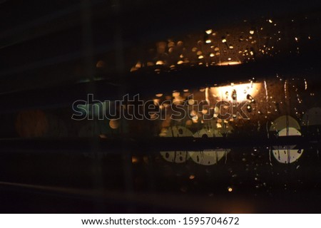 a rainy night photographed from the room