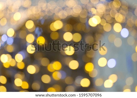Background with golden and white city lights. Blurred picture.