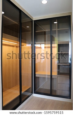 close up detail of wardrobe with sliding door Royalty-Free Stock Photo #1595759515