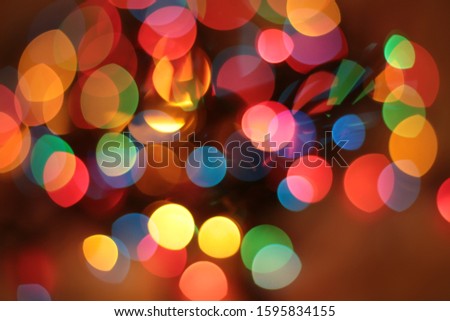 New Year spark of sparkler macro multicolor garland bokeh christmas background