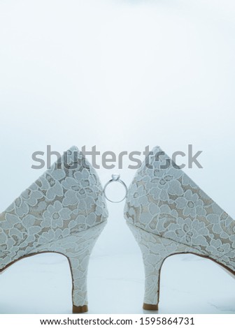 Wedding concept, shoes, ring on white background.Love romance background for Marry or Valentine day
