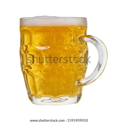 light beer in a glass on white isolated background                               
