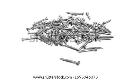 Metal screws isolated on white background, industrial construction tools image. Nail screw concept background, steel hardware instruments pile, front view. Silver screw heap, repair equipment.