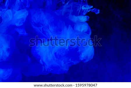 Beautiful space blue abstract background. Stylish modern technology background. Watercolor ink in water. Cool trending screensaver.