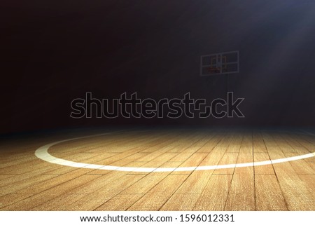 Basketball court with wooden floor and a basketball hoop over dark background