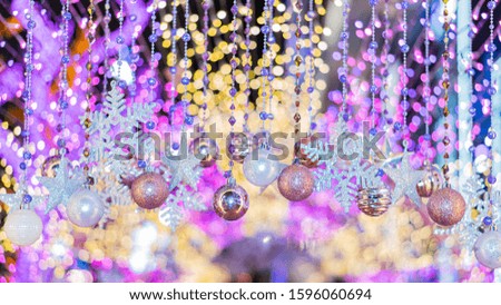 Ornaments with beautiful snowflakes and Christmas bulbs