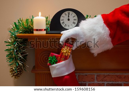 Midnight on Christmas Eve and Santa Claus (or Father Christmas) has come down the chimney to deliver your presents.