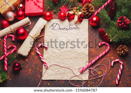 Christmas composition with empty paper sheet on color background