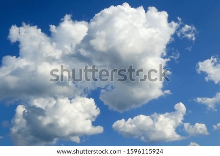 Blue white background. Blue sky with clouds. Ideas for your design and have copy space for text.