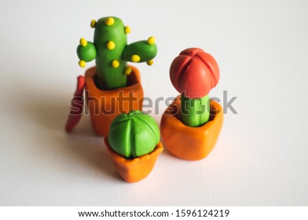 Green cactus from plasticine.Hand made work.