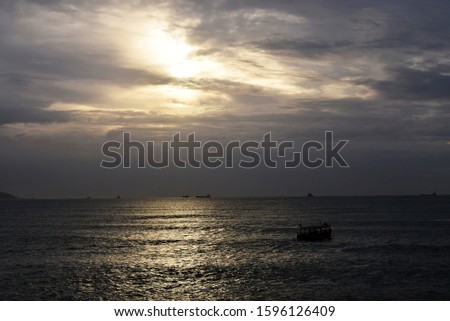 Amazing sunset in the Mediterranean sea. sun rays running through the clouds in the sky.