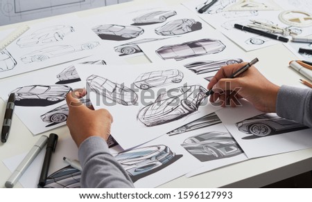 Designer engineer automotive design drawing sketch development Prototype concept car industrial creative.                               