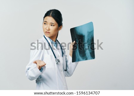 X-ray woman stethoscope medical gown