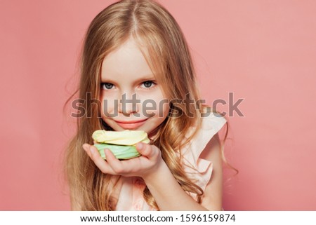 little girl eating cake with cream cupcake sweet