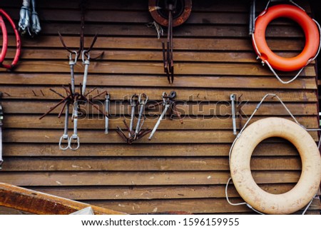 anchor buoy hang on the wooden wall