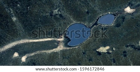 abstract photography of the deserts of Africa from the air, aerial view of desert landscapes, abstract expressionism photo, contemporary photo art