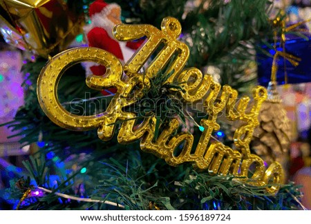 Decorated on the Christmas tree. Christmas signs hanging on the Christmas tree.