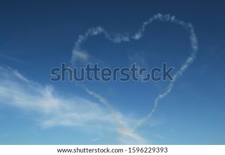 photo of airplane trails on the sky 