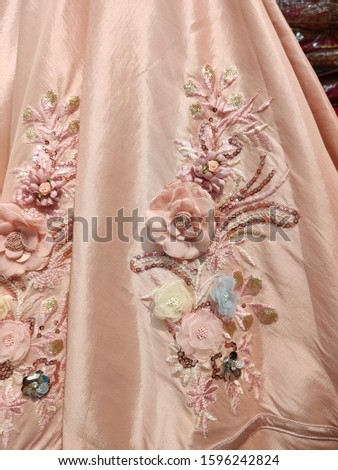beautiful floral pattern on ladies gown