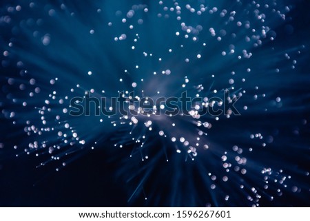 Optical fibers close up macro shot. Abstract & technological background.