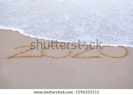 2020 writing in the sand  beach in the morning, appropriate the Backdrop idea copy space