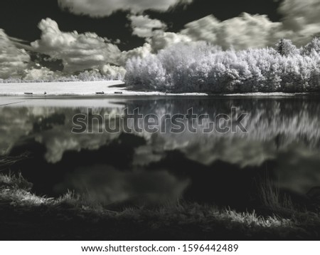 surreal infrared photography, beautiful cumulus clouds and water reflections