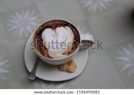 coffee cup of mocca macchiato in evening time