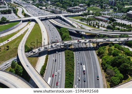 Aerial view of Interstate 85 and Interstate 20 interchange bridges and ramps in Atlanta Georgia.   Royalty-Free Stock Photo #1596492568