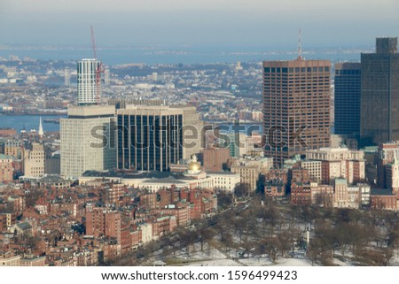 Aerial view of the Massachusetts State House, Boston Common, and the skyline of Boston, Massachusetts