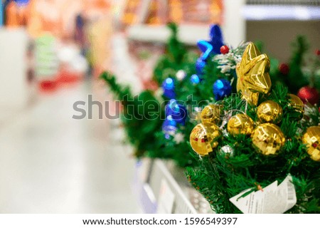 Photo of christmas tree decoration for new year and christmas. Bright lights and colors, festive mood. The concept of a happy meeting of Christmas and New Year.