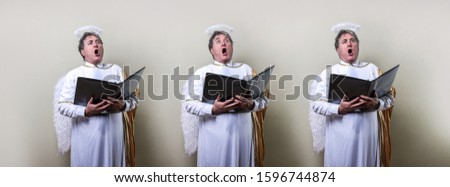 Angel choir group singing carols