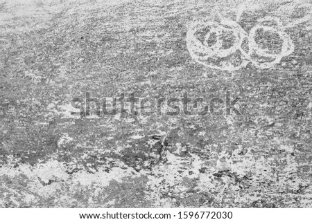 Close-up of White cement crack wall and peeled paint caused by water and sunlight. Peel wall of White house paint with black stain. Black and White of Texture background.