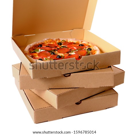 Freshly baked Italian pepperoni Pizza with a stack of delivery boxes isolated on a white background.