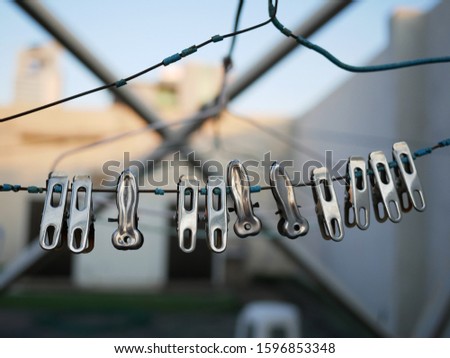 metal cloth clip hanging at hanggers.   