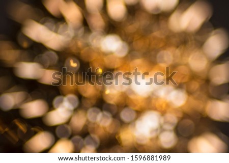 shiny golden christmas background, blurred defocused festive background