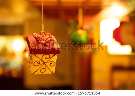 Christmas ornaments hanging from the ceiling 