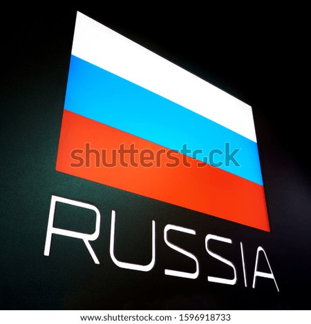 Russia flag and text on black isolated