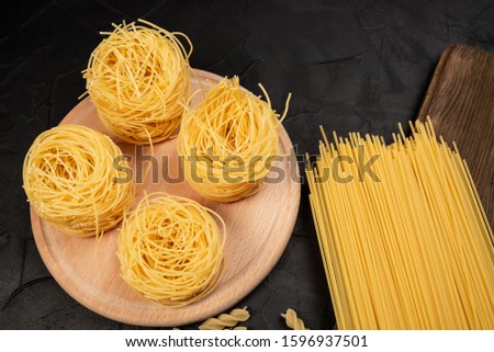 Raw fettucine pasta ready for bowling