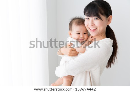 young asian mother and baby Royalty-Free Stock Photo #159694442